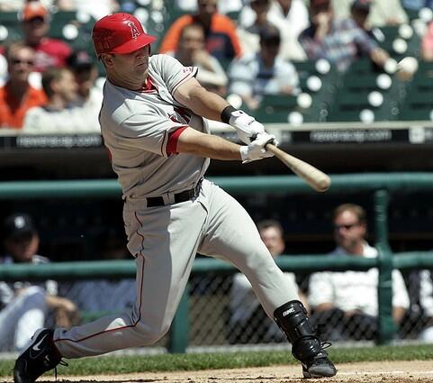 Angel catcher Mike Napoli hits a solo home run off Detroit Tigers pitcher Justin Verlander.