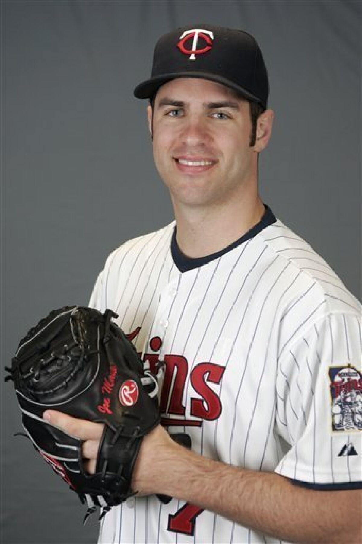 FILE - This is a 2009 file photo showing Minnesota Twins baseball player Joe Mauer. Mauer has become only the second catcher in 33 years to win the American League Most Valuable Player Award, Monday, Nov. 23, 2009. (AP Photo/Steve Senne, File)