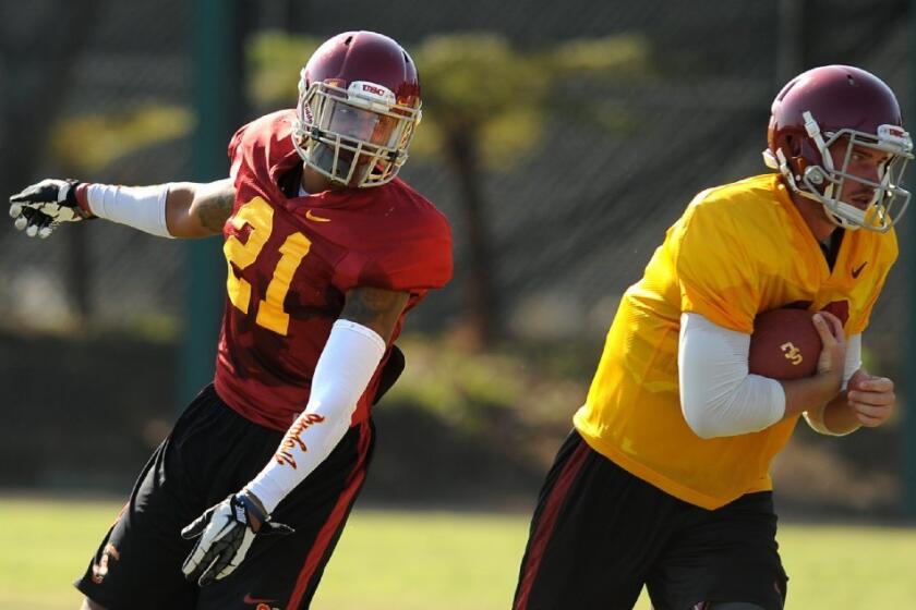 Su'a Cravens (21) says many family members will be on hand for his first game at the Coliseum.