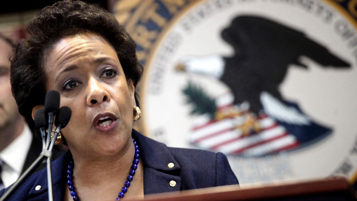 U.S. Attorney General Loretta Lynch announces an indictment against nine FIFA officials and five corporate executives for racketeering, conspiracy and corruption at a news conference Wednesday in New York.