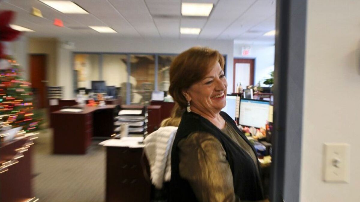 Bobbi Manka pokes her head into her boss' office.