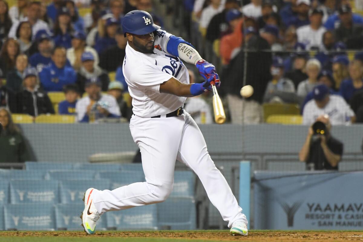 Los Angeles Dodgers' Hanser Alberto hits a home run against the Pittsburgh Pirates.