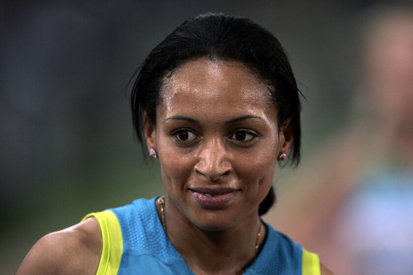 FILE - Morocco's Halima Hachlaf reacts after winning the women's 800 meters event during the IAAF Diamond League Golden Gala athletics meeting at Rome's Olympic stadium, June 10, 2010. Moroccan 800-meter runner Halima Hachlaf has been banned for six years for the second doping conviction of her career, it was announced Tuesday, Nov. 30, 2021. Hachlaf tested positive for a synthetic steroid hormone at a race in Rabat in January. (AP Photo/Riccardo De Luca, file)