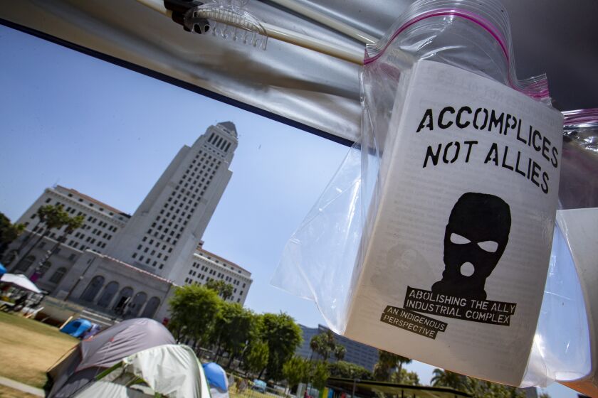 LOS ANGELES, CA - JULY 24: A group of people with the shared goal of promoting Black unity occupy an encampment in Grand Park on Friday, July 24, 2020 in Los Angeles, CA. (Brian van der Brug / Los Angeles Times)