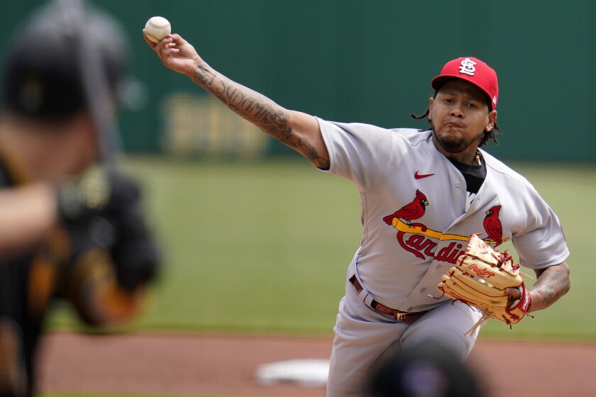St. Louis Cardinals starting pitcher Carlos Martinez delivers during the first inning of a baseball game against the Pittsburgh Pirates in Pittsburgh, Sunday, May 2, 2021.(AP Photo/Gene J. Puskar)