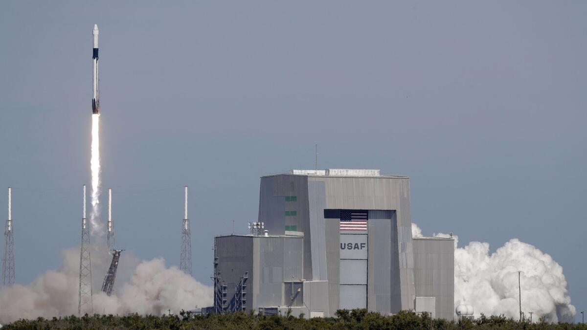 A SpaceX Falcon 9 rocket launches from Cape Canaveral Air Force Station in Florida on Dec. 5. An Air Force official said he had no concerns about the company's processes, weeks after NASA ordered a review of SpaceX and Boeing's workplace safety culture.