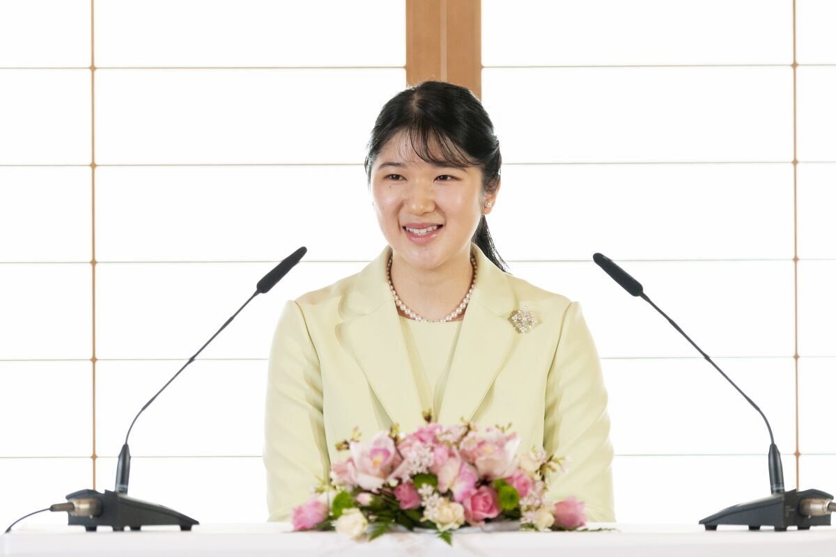 In this photo provided by Japan's Imperial Household Agency, Japanese Princess Aiko, the daughter of Emperor Naruhito and Empress Masako, speaks during her first news conference after she made her debut as a new adult member of the Imperial family, Thursday, March 17, 2022, in Tokyo. Japanese Emperor Naruhito’s only daughter, Princess Aiko, in her first solo news conference Thursday as an adult royal member, said she hopes to stay close to the people, an example she has learned from her popular grandparents. (The Imperial Household Agency of Japan via AP)