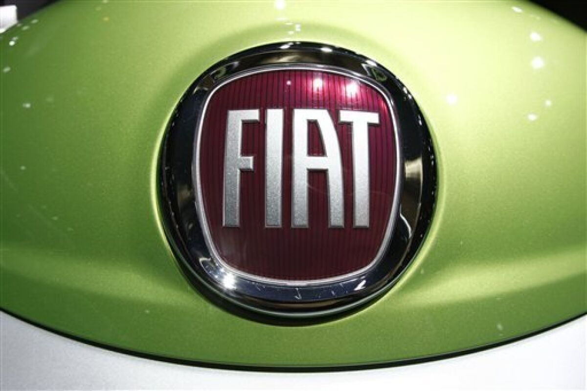 FILE - In this Sept. 23, 2008 file photo, the emblem of Fiat is pictured on a commercial vehicle at the 62st IAA International Motor Show Commercial Vehicles in Hanover, northern Germany. Italian automaker Fiat Group SpA will sign paperwork to become a partner with Chrysler LLC by Thursday, April 30, 2009, according to three people briefed on the deal. The partnership is the last piece of a huge restructuring plan needed to keep Chrysler alive as it approaches Thursday's government deadline to cut labor costs, slash debt and take on a partner. (AP Photo/Joerg Sarbach, File)