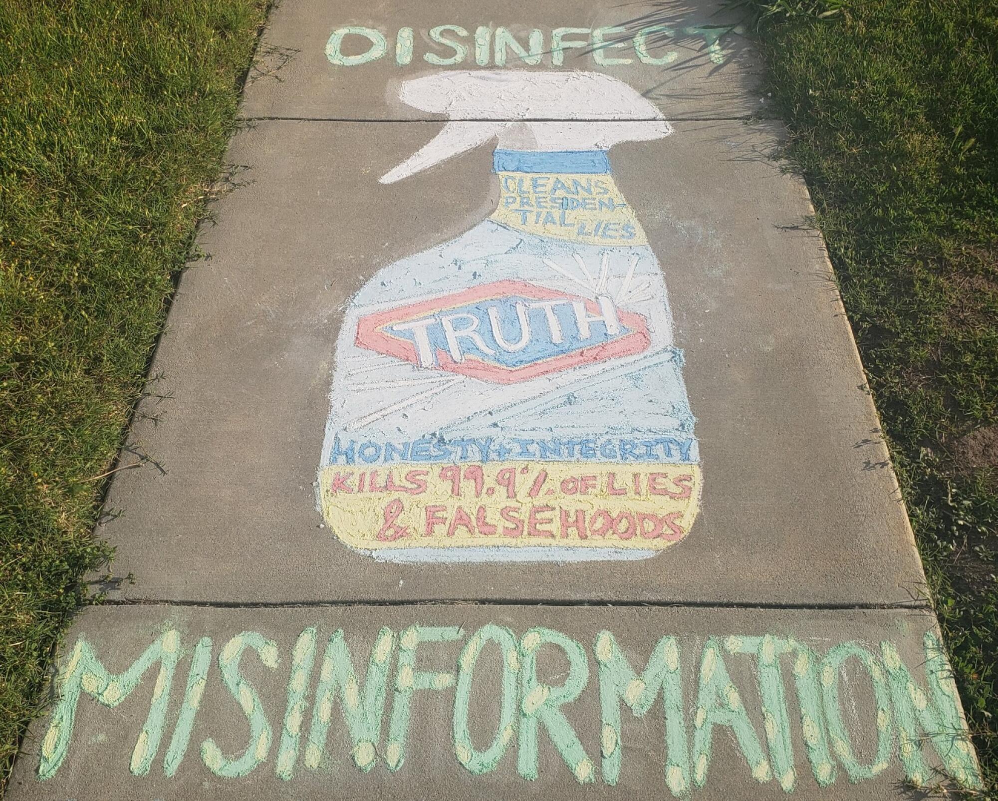 Sidewalk chalk art created by a 16-year-old says disinfect misinformation with a drawing of a spray bottle