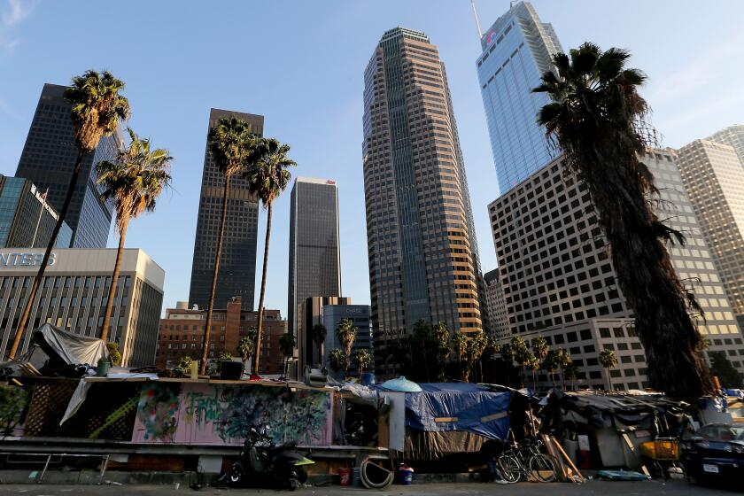 LOS ANGELES CA. - DEC. 6, 2020. Homeless dwellings along Beaudry Street in downtown Los Angeles. (Luis Sinco/Los Angeles Times)
