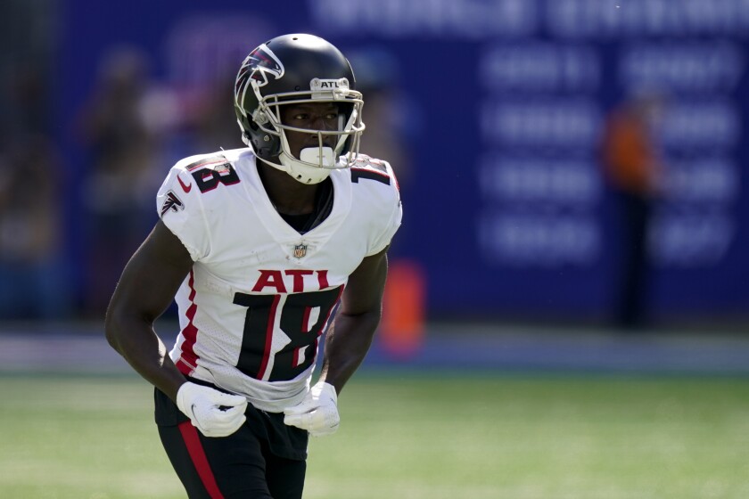 Atlanta Falcons wide receiver Calvin Ridley gets set at the line of scrimmage before a play.
