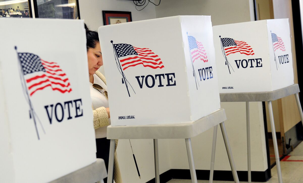 A voter makes selections at the L.A. County Registrar-Recorder's Office in Norwalk on Nov. 3.