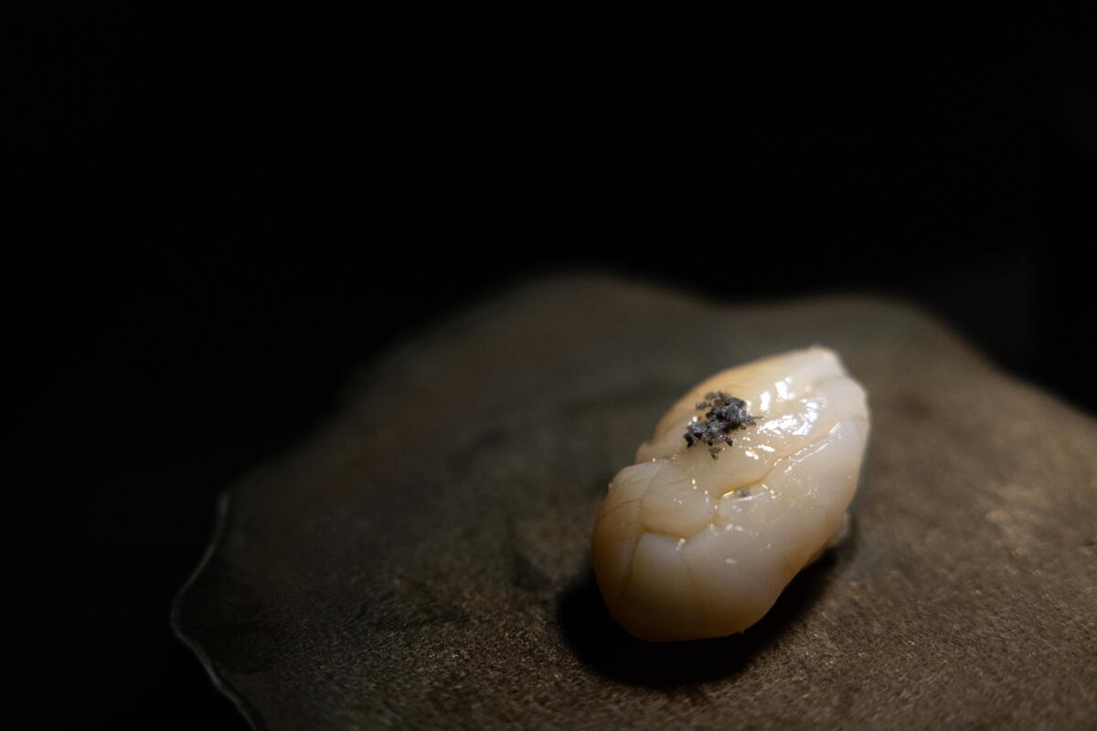 Hotate scallop with bamboo charcoal salt and ponzu at Taikun.