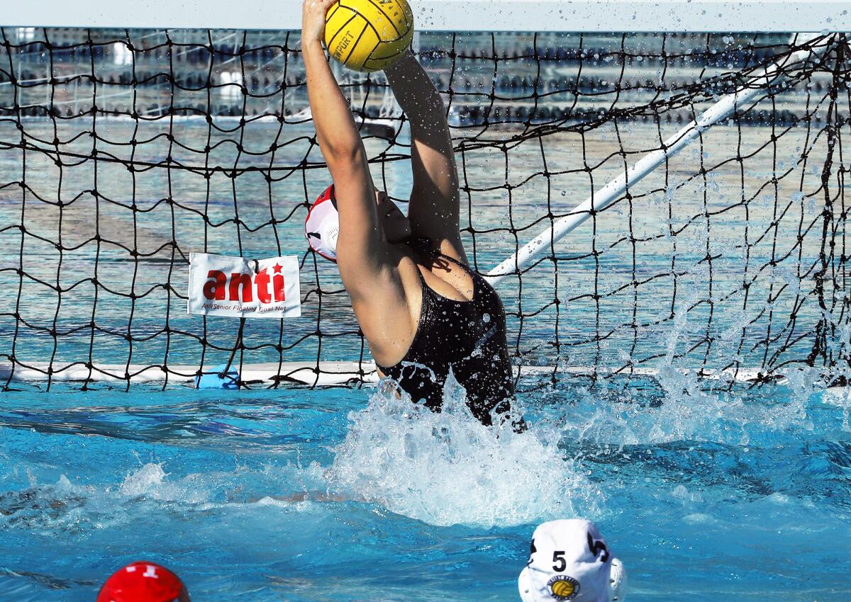 Newport Harbor's goalie Lydia Soderberg (1) makes a save against Orange Lutheran on Saturday.