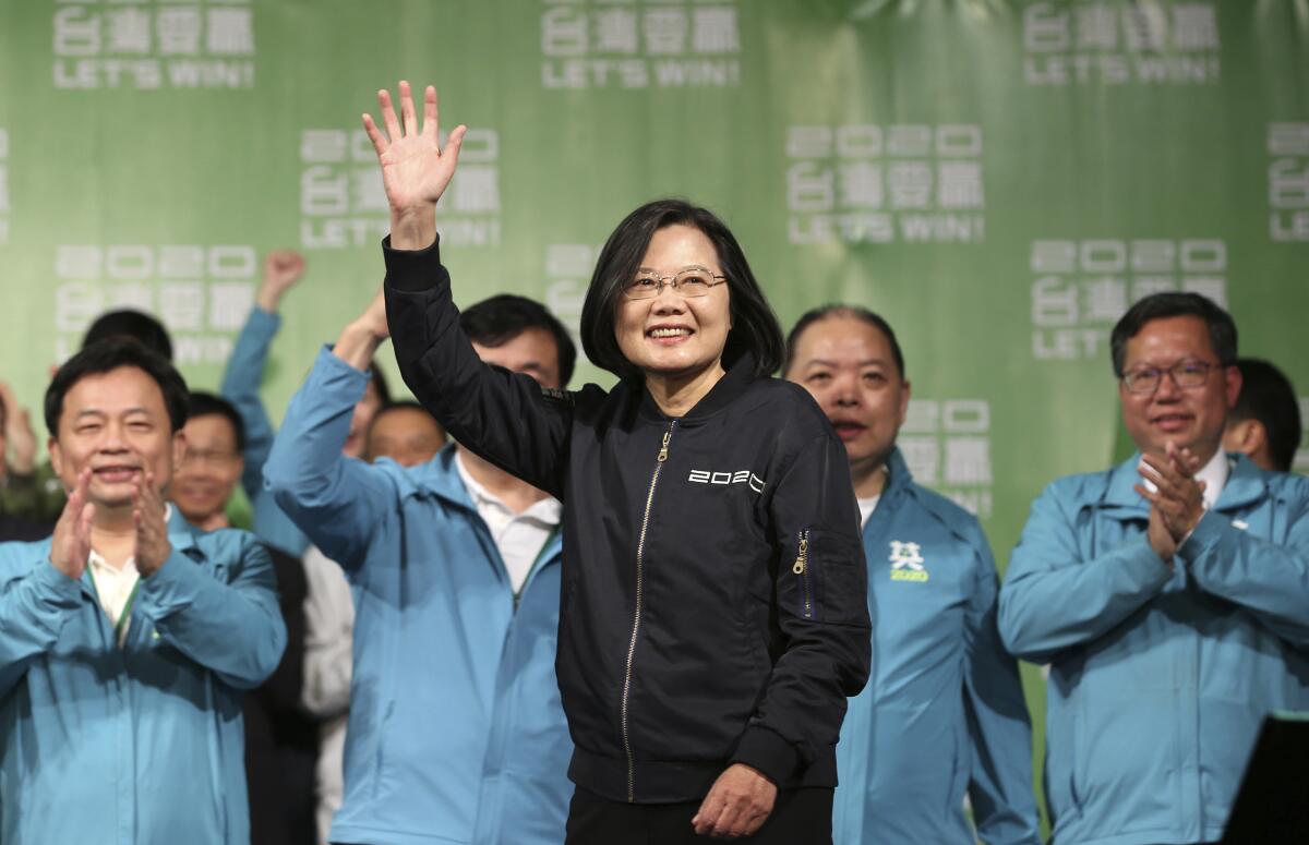 Taiwanese President Tsai Ing-wen celebrates her reelection victory with supporters in Taipei on Jan. 11.