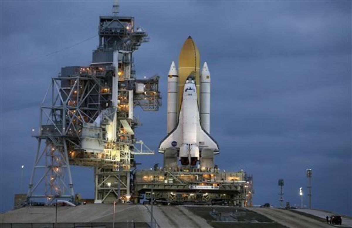 the space shuttle on pad