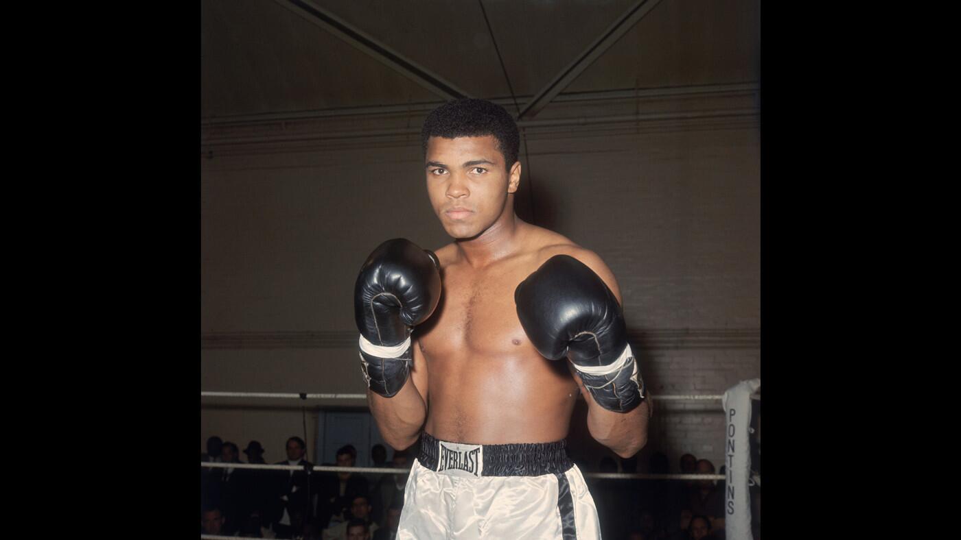 Muhammad Ali's speed and grace redefined what it means to be a boxer. In this 1966 photo, he is training at Royal Artillery Gymnasium in London for his fight with British champion Henry Cooper. (Ali won the match.)