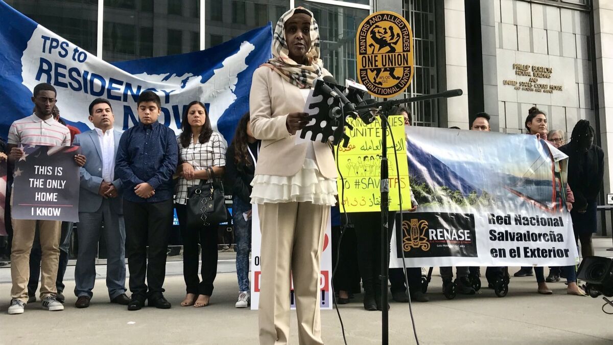 Hiwaida Elarabi of Massachusetts, speaking outside the federal building in San Francisco last month, is a Sudanese beneficiary of Temporary Protected Status and a plaintiff in the lawsuit over the termination of those protections.