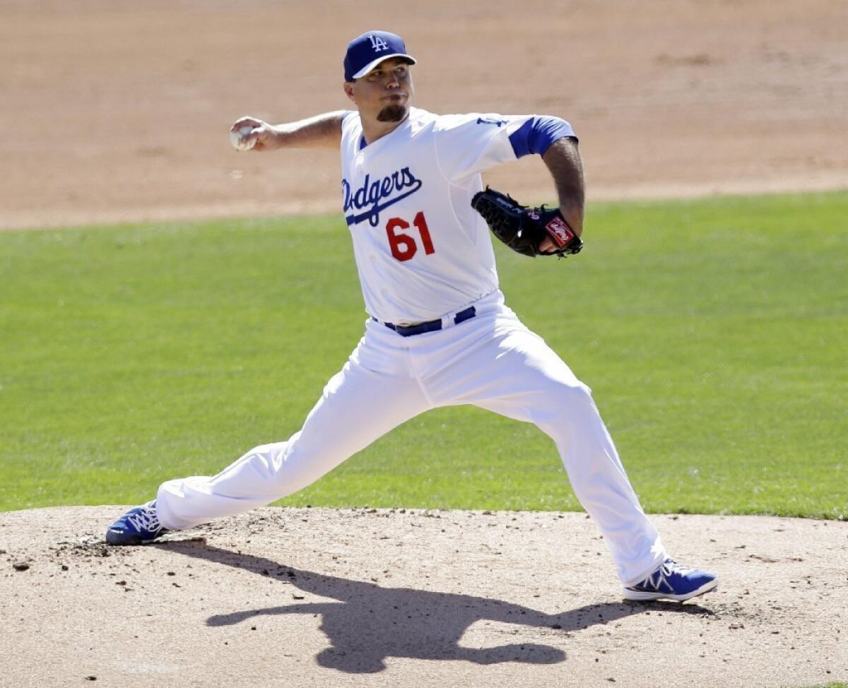 Josh Beckett, shown here earlier in the exhibition season, pitched four strong innings on Thursday.