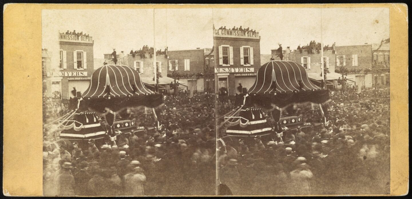A crowd surrounds the funeral procession for President Abraham Lincoln in Philadelphia in April 1865.