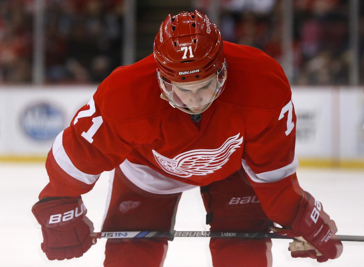 Red Wings center Dylan Larkin rests against the Montreal Canadiens in the third period on March 24.