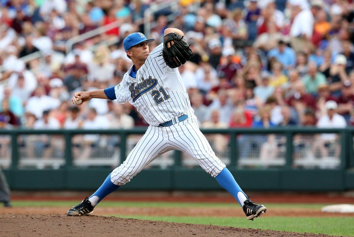 UCLA's Nick Vander Tuig delivers a pitch against Mississippi State in Game 2 of the College World Series on Tuesday.