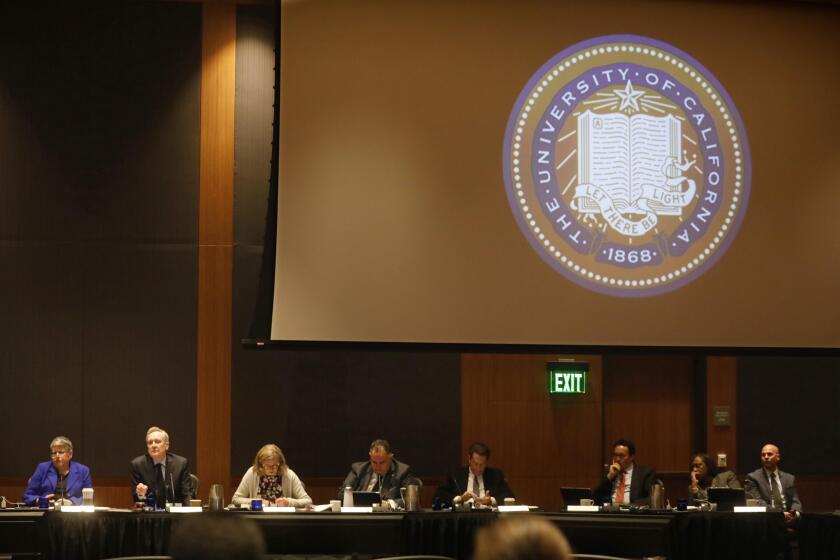 WESTWOOD, CA - MARCH 13, 2019 ? UC President Janet Napolitano, from left, Regent George Kieffer, Anne L. Shaw, Secretary and Chief of Staff to the Regents, and Regents John A. Perez, Howard Guber, Richard Leib and Laphonza Butler listen to students concerns during the open session of the Regents meeting at UCLA in Westwood on March 13, 2019. A UCLA men's soccer coach was put on leave for being involved in the bribery scandal. Only two students mentioned the scandal during the open session of the meeting. Most students at the meeting were there to protest tuition increase and fair pay for workers throughout the UC campuses. (Genaro Molina/Los Angeles Times)