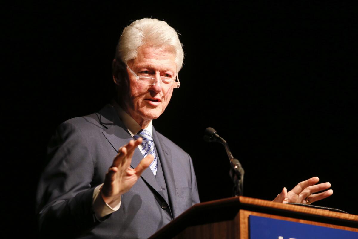 Former President Bill Clinton speaking in Austin, where he endorsed the use of a Social Security photo ID card for voting.