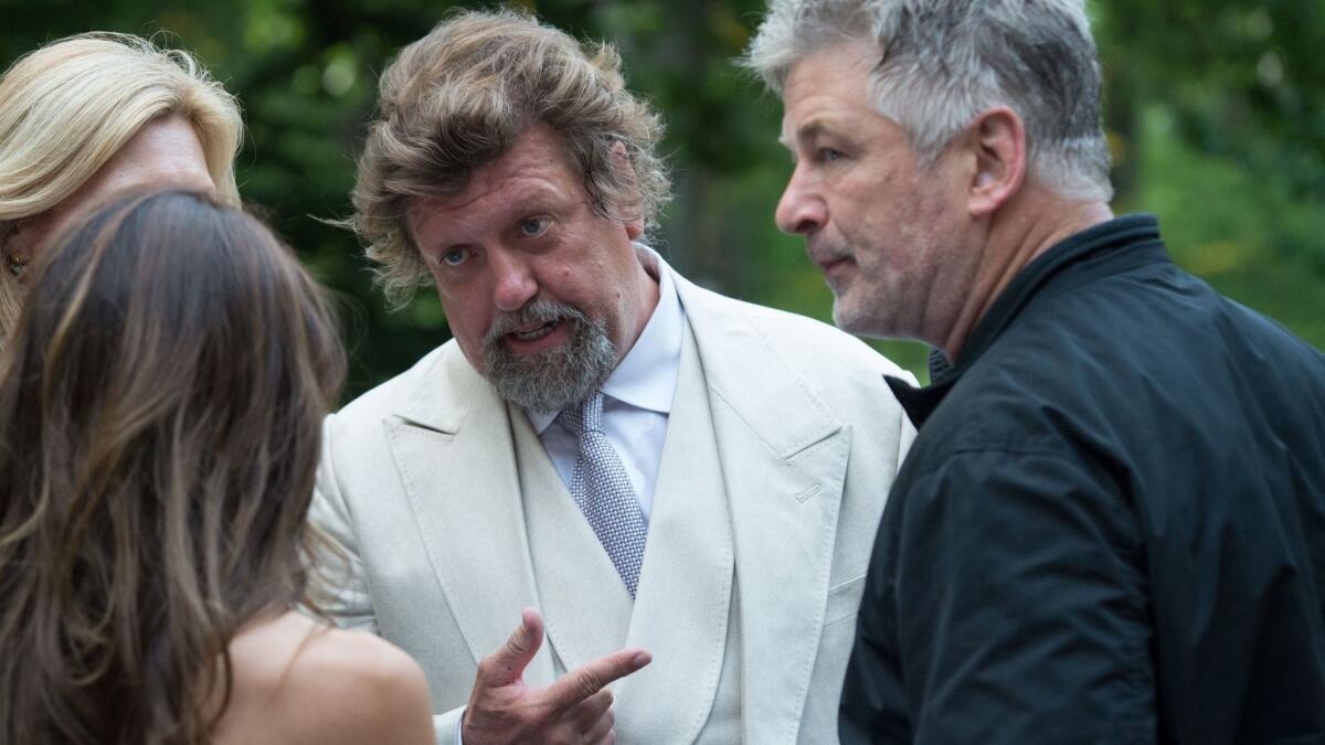 Public Theater artistic director Oskar Eustis, center, and actor Alec Baldwin, right, on the opening night of Shakespeare in the Park's 2017 production of "Julius Caesar" at Central Park's Delacorte Theater.