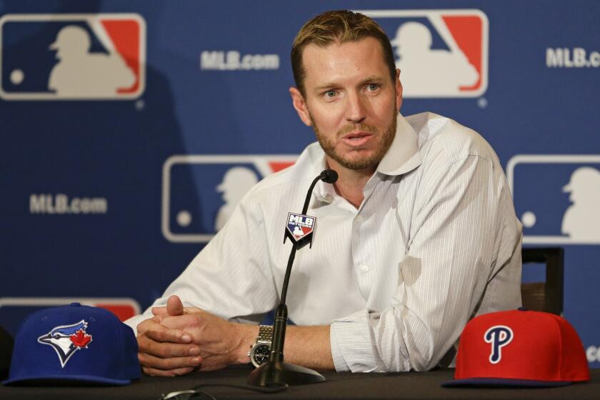 Two-time Cy Young Award winner Roy Halladay announces his retirement after 16 seasons in the major leagues Monday at the MLB winter meetings in Lake Buena Vista, Fla.