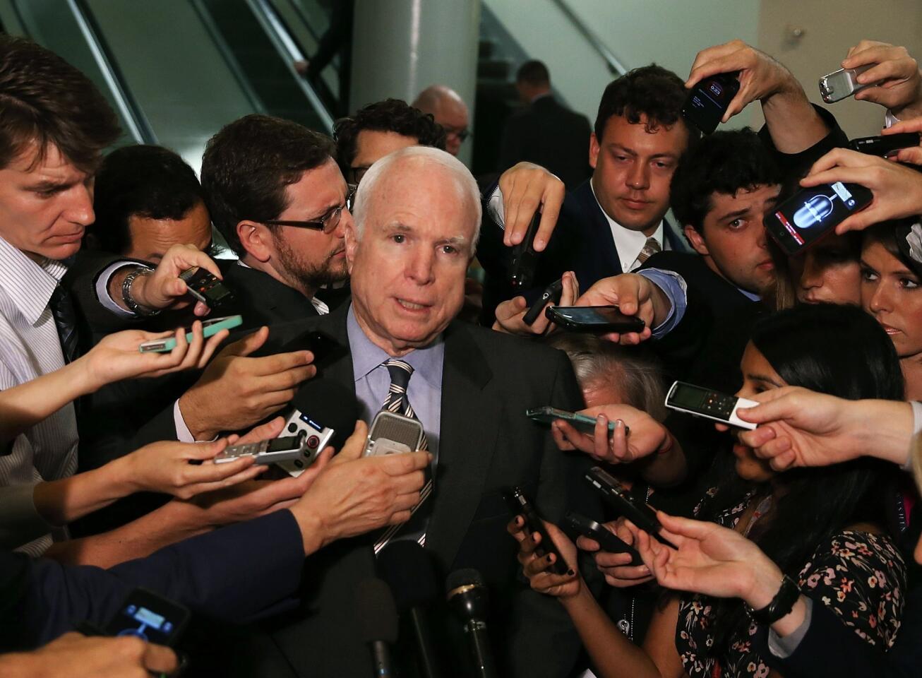 McCain swarmed