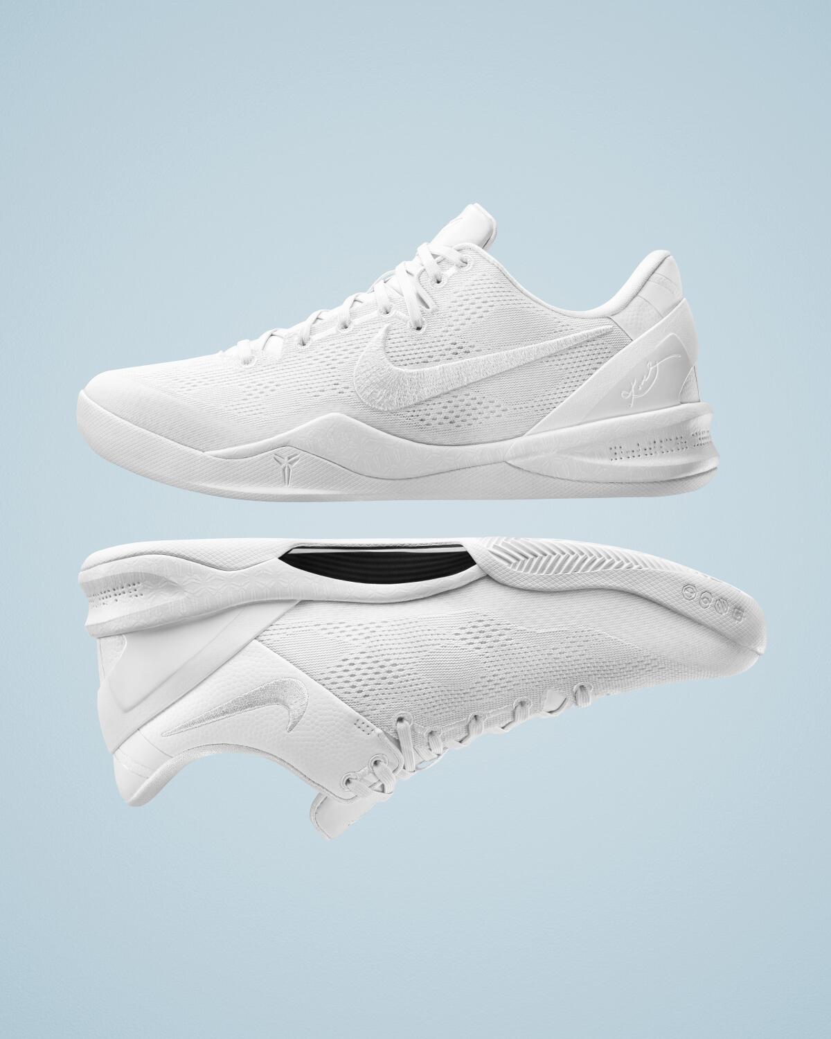 A pair of white Nike Kobe 8 Protro Halo shoes.