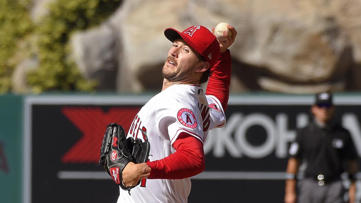 Angels starting pitcher Griffin Canning throws against the Houston Astros on Aug. 1.