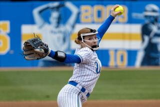 WESTWOOD, CA - MAY 23, 2024: UCLA starting pitcher Kaitlyn Terry (55) starts her windup.