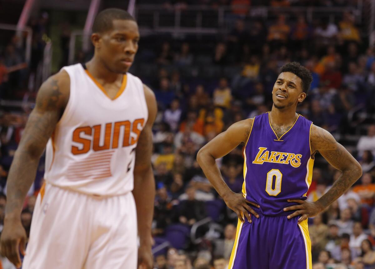Lakers guard Nick Young reacts after being called for a foul against Suns guard Eric Bledsoe in the second half of the Suns' 115-100 win.