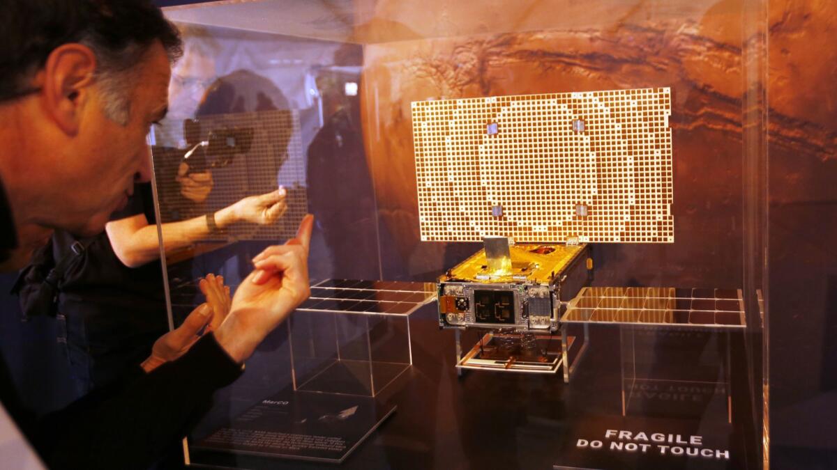 A display of the CubeSat that NASA launched with the stationary lander called InSight too Mars. Riding along with InSight were two CubeSats - the first of this kind of spacecraft to fly to deep space.