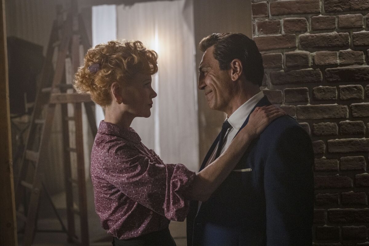 This image released by Amazon shows Nicole Kidman as Lucille Ball, left, and Javier Bardem as Desi Arnaz in a scene from "Being the Ricardos." (Glen Wilson/Amazon via AP)