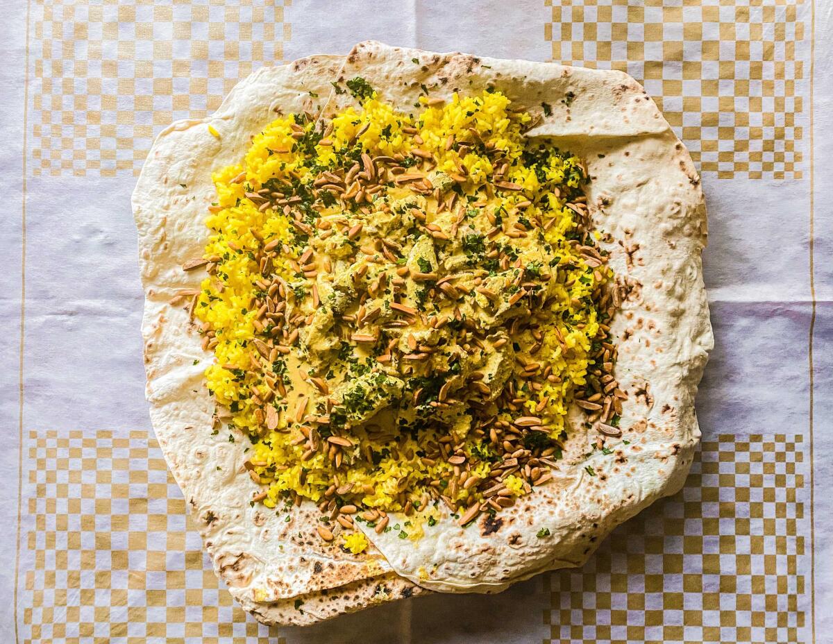 Mansaf, a feast of lamb in yogurt sauce over rice and flatbread that is often called the national dish of Jordan.