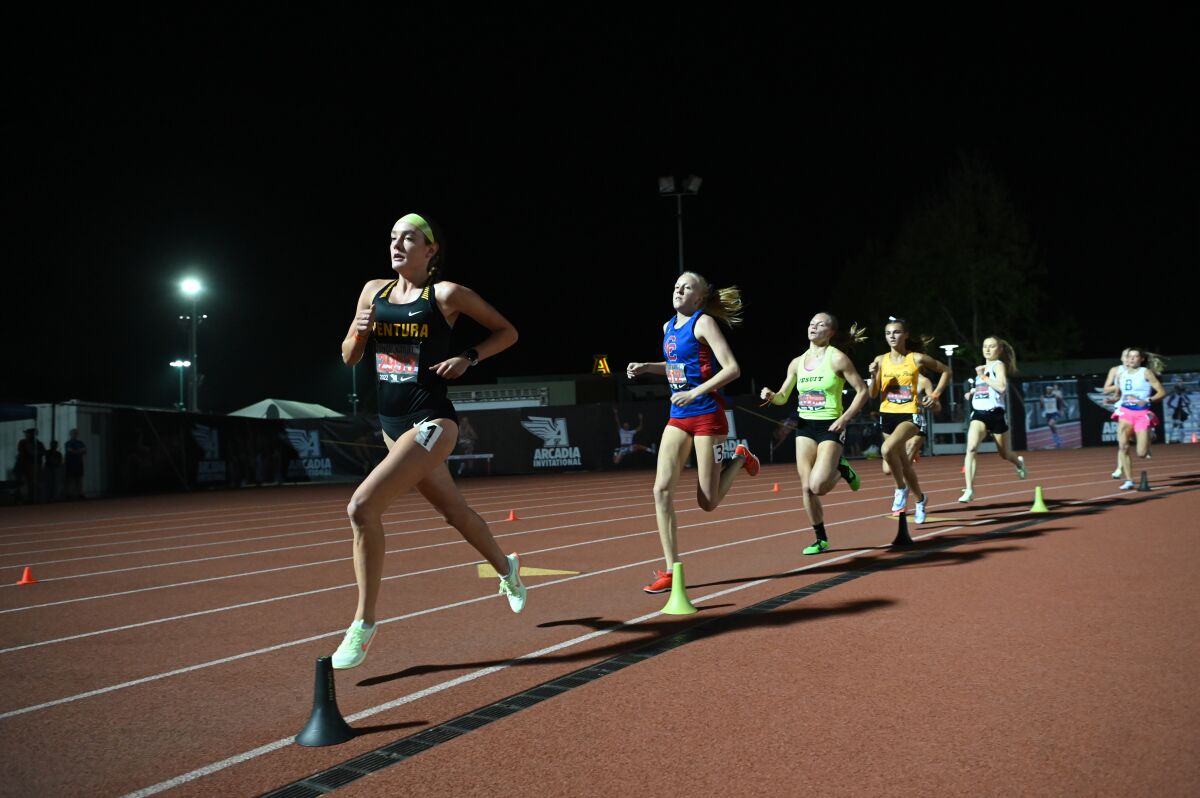 Ventura High's Sadie Engelhardt leads the field in the girls' 1,600-meter run at the 2022 Arcadia Invitational.