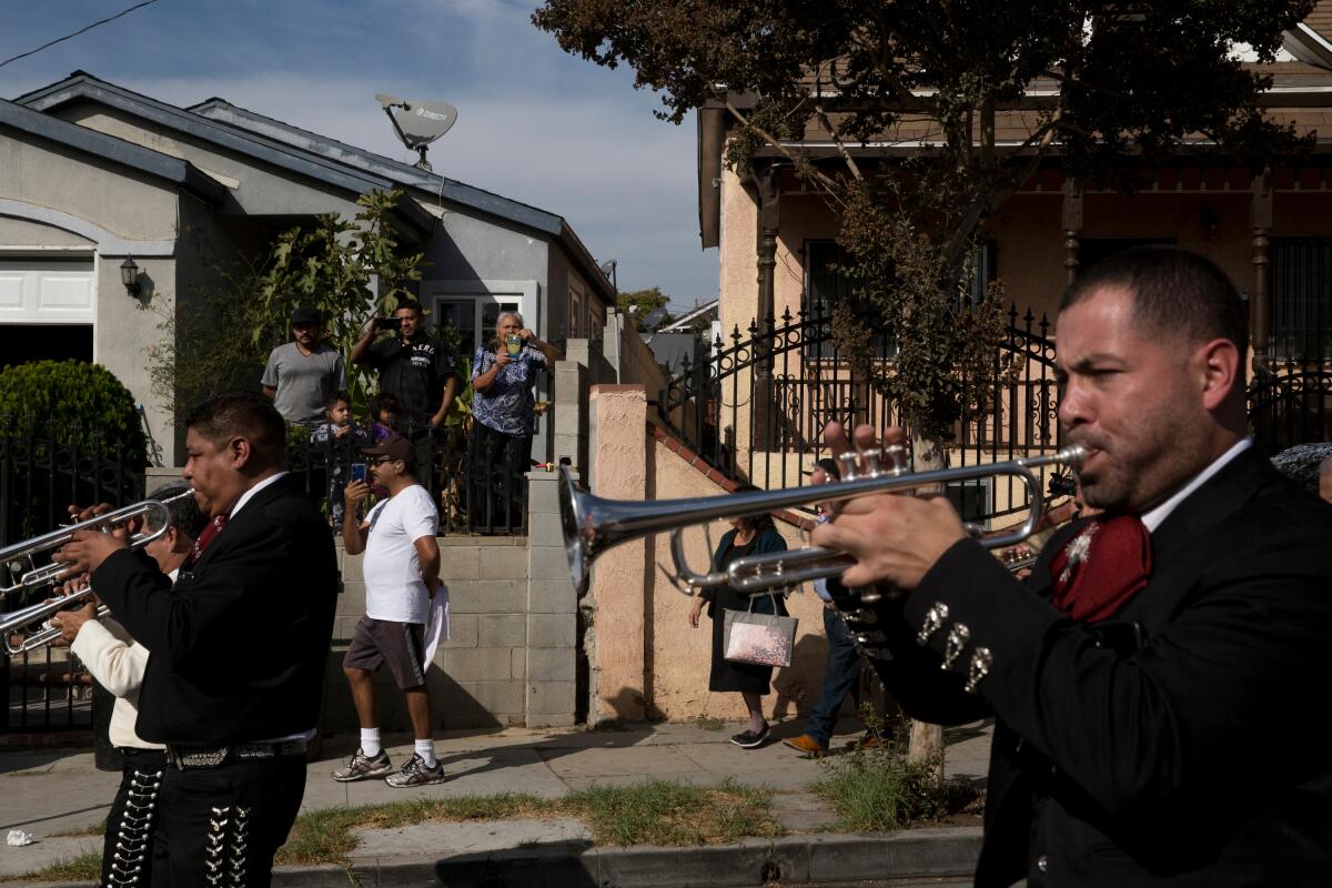 Mariachis march in Boyle Heights 