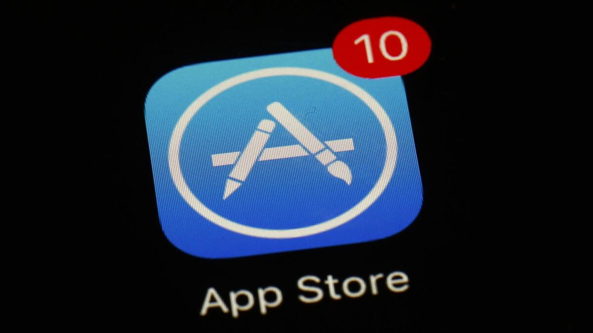 An iPhone bears the App Store icon.