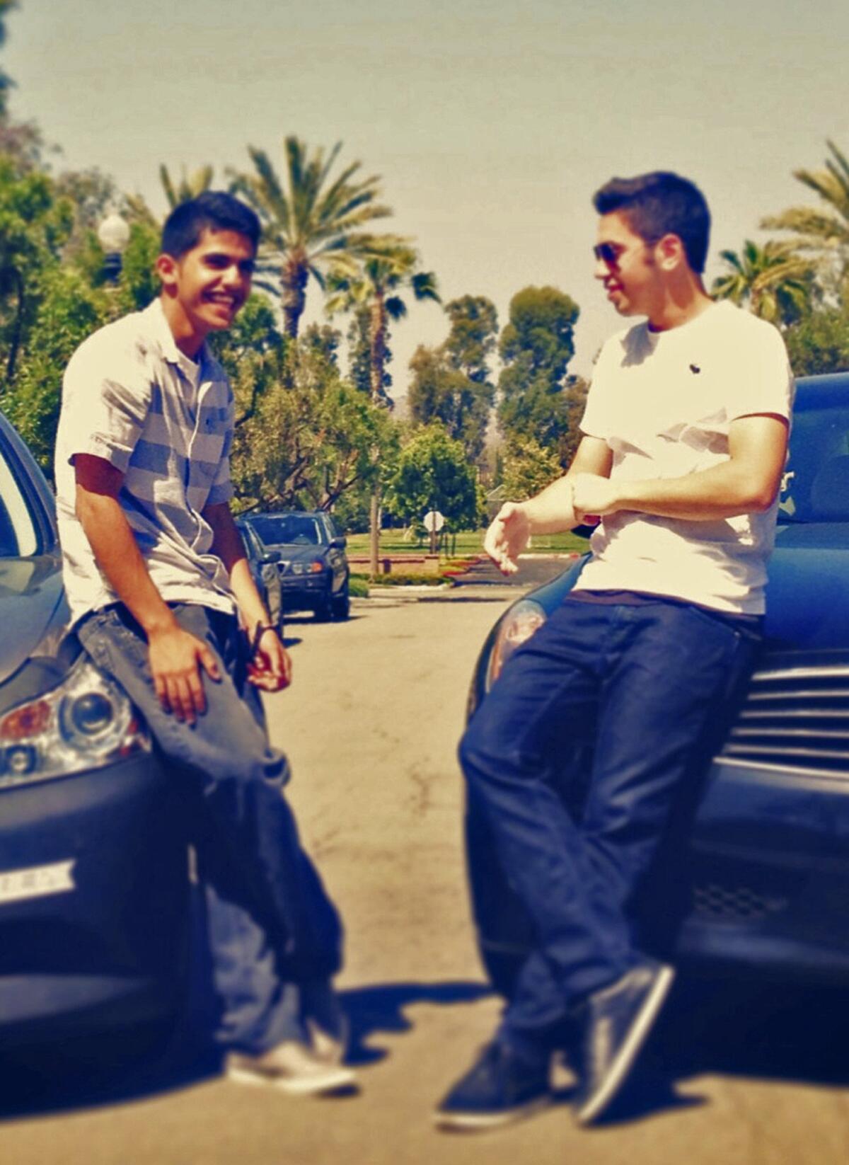 A cell phone photo of Abdulrahman Alyahyan, left, the driver of the car in which 5 teenagers were killed on Monday in Newport Beach, CA. On the right is his Irvine High School friend Omar Soussan, who provided the photo.