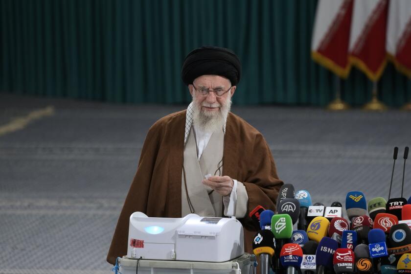 Iranian Supreme Leader Ayatollah Ali Khamenei votes for the parliamentary runoff elections, in Tehran, Iran, Friday, May 10, 2024. (AP Photo/Vahid Salemi)