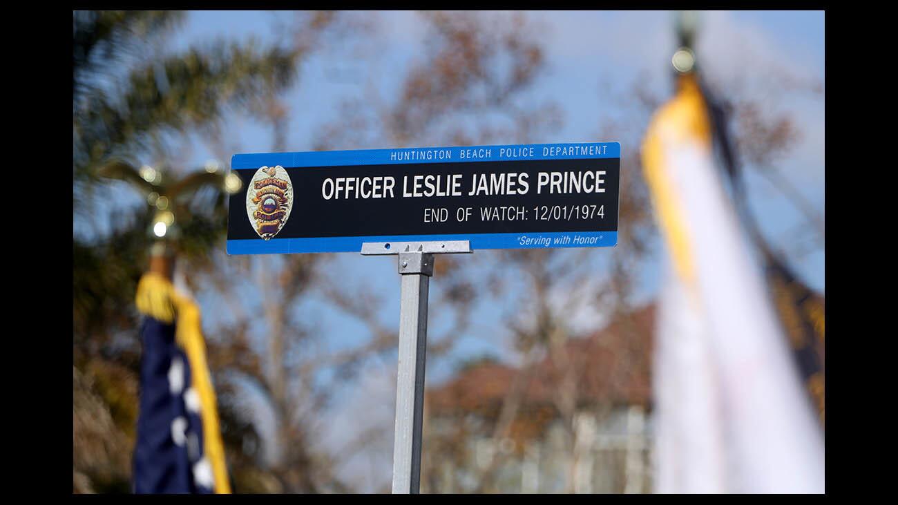 Fallen officer Leslie James Prince street sign was unveiled at dedication ceremony on the 8000 block of Adams Ave., in Huntington Beach, on Saturday, Dec. 1, 2018. Officer Prince lost his life when a drunk driver struck him at the nearby intersection of Adams and Beach Blvd. in 1974.
