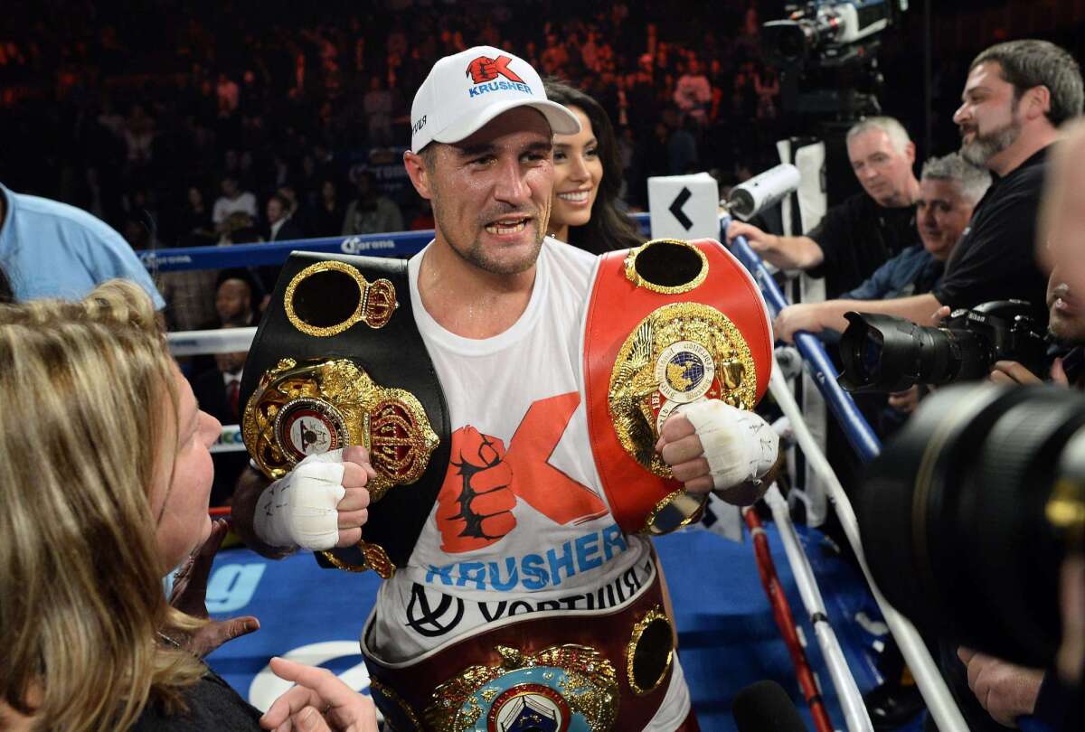 Sergey Kovalev celebrates after defeating Bernard Hopkins during their IBF, WBA and WBO light-heavyweight title bout Saturday in Atlantic City, N.J.