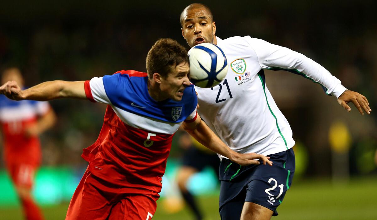 U.S. defender Matt Besler, left, tries to clear the ball against Ireland forward David McGoldrick during a 4-1 loss earlier this month.