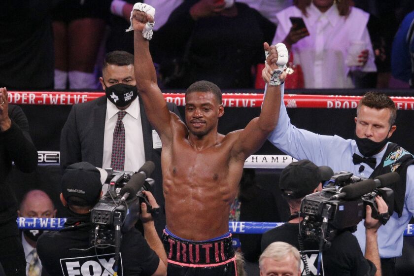 Errol Spence Jr. celebrates after defeating Danny Garcia by unanimous decision.