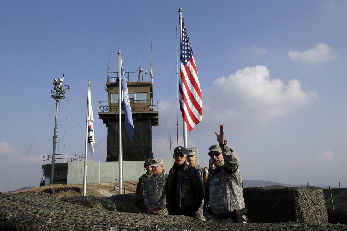 Then-U.S. Vice President Joe Biden visits the demilitarized zone between the Koreas in 2013.