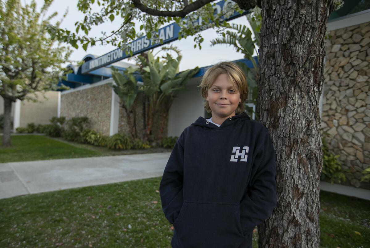 Miller Ruiz, 11, outside Huntington Christian School in Huntington Beach on Thursday.