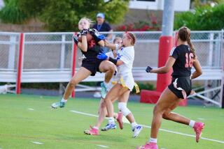 Josie Anderson intercepts a pass in the end zone to preserve Orange Lutheran's 20-13 victory.